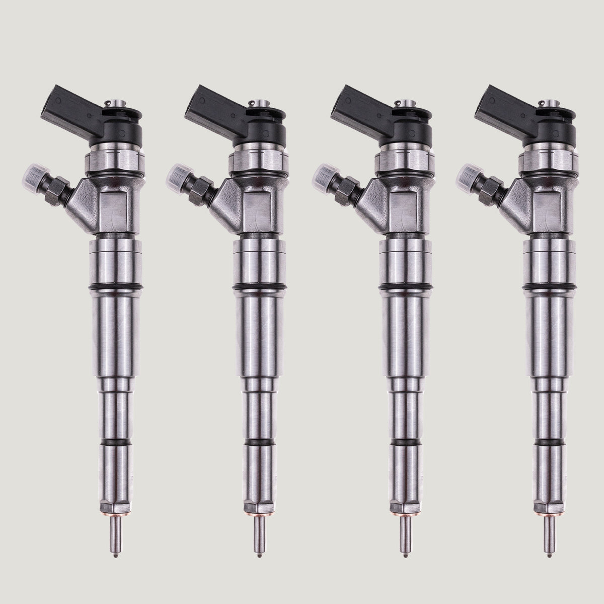 Set of 4 diesel fuel injectors with part numbers 0445110131 and 13537789661 for BMW E46 320d and 330d models